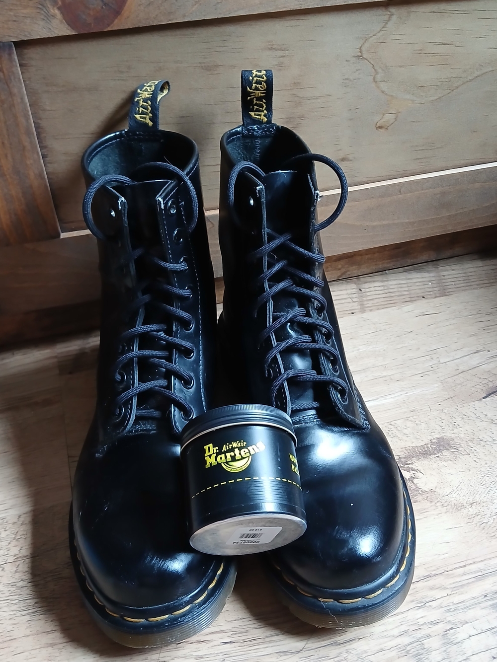 Dr. Martens Black Leather 8-Eye Lace-Up Boots with Yellow Stitching